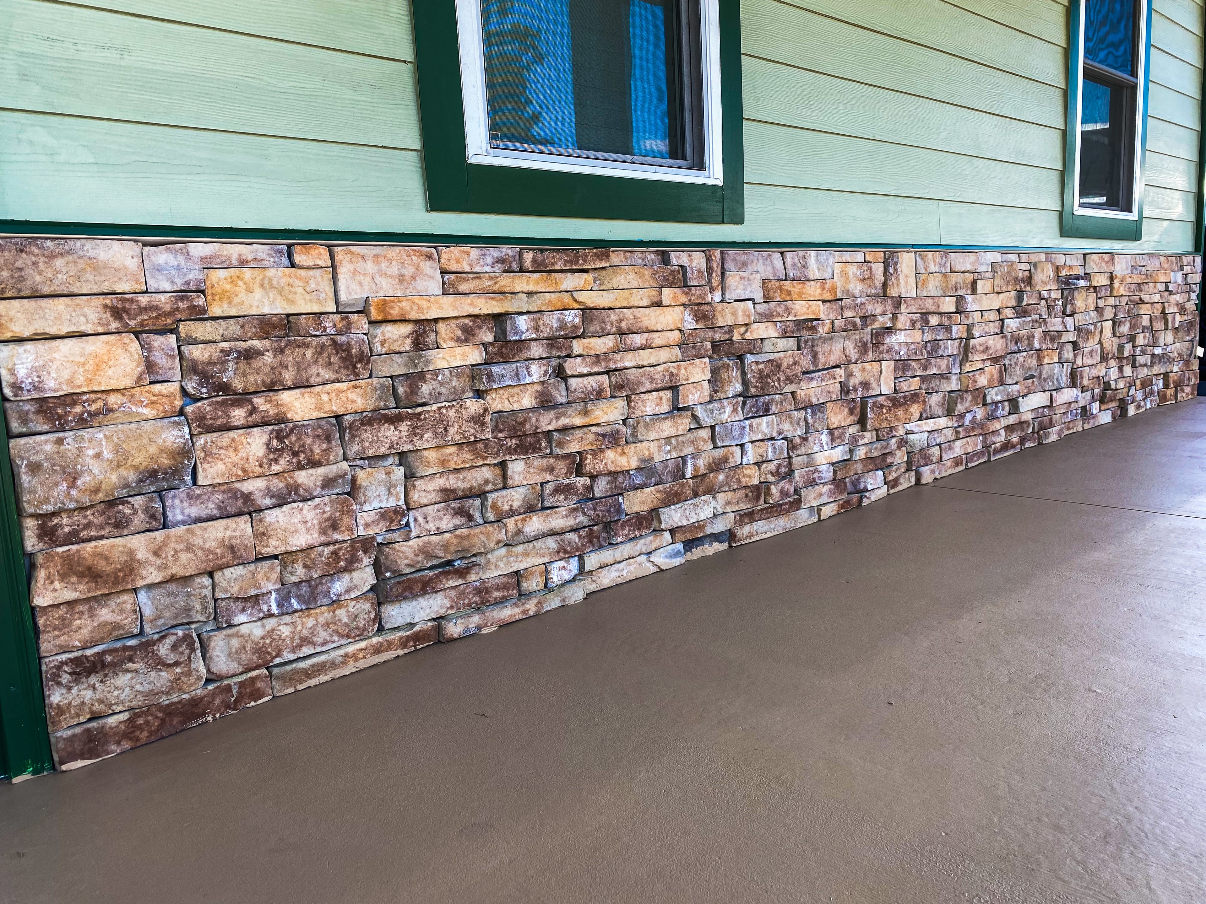 Stone veneer foundation house exterior