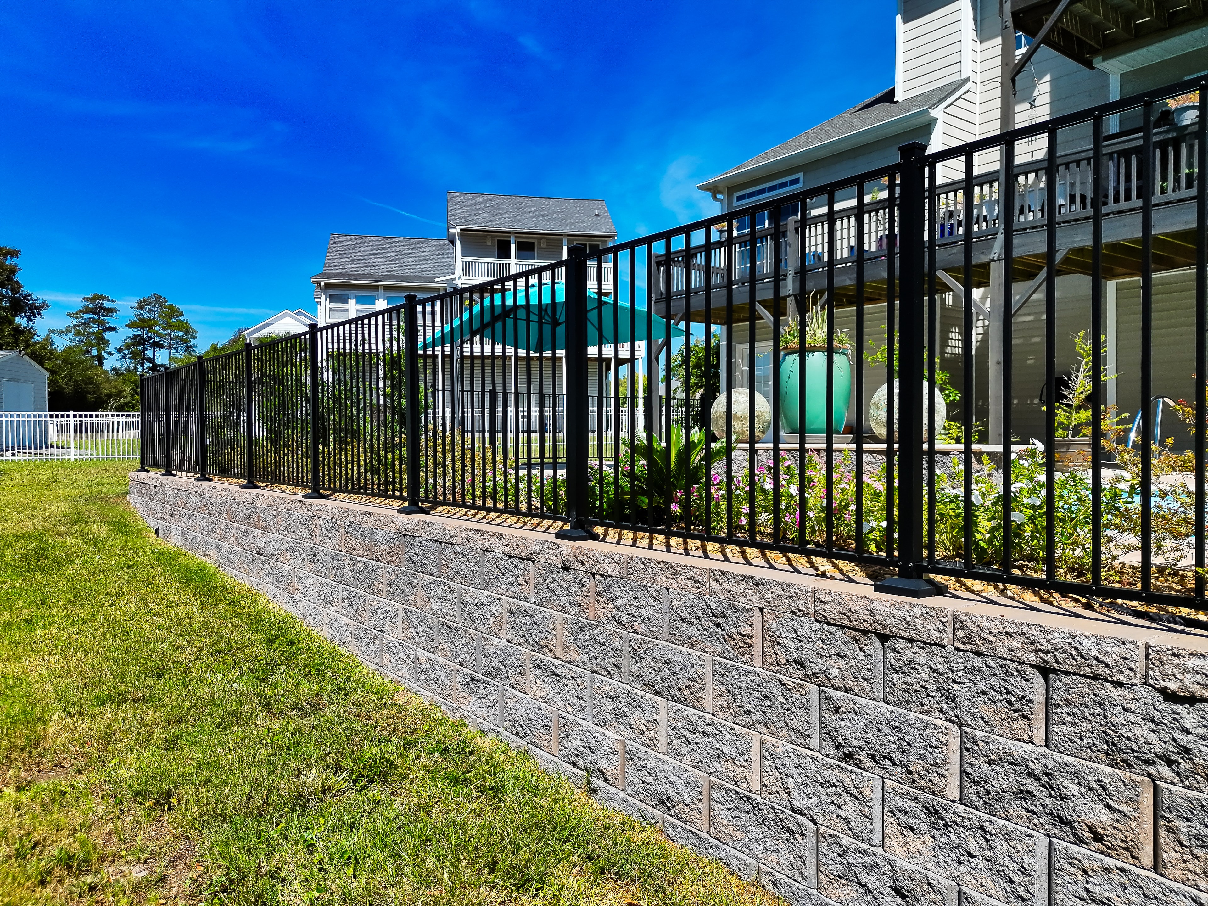 Black metal fence residential property